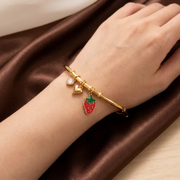 Gold_slim_bangle_-_Slim_bangle_-_Strawberry+heart+crystal_drop_charms