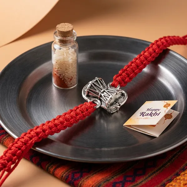 925_Sterling_Silver_Shiv_Dumru_Rakhi_With_Roli_Chawal_Glass_Bottle_And_Happy_Rakhi_Card
