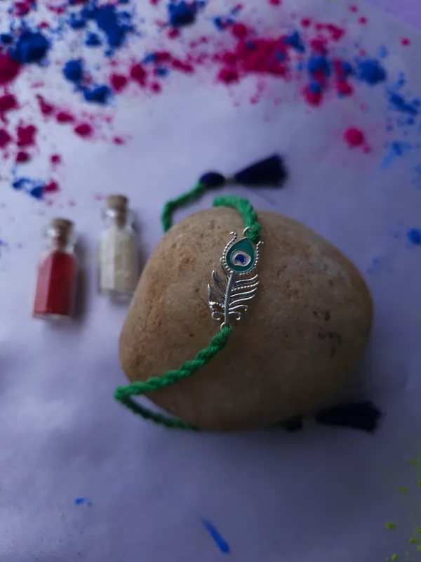 925_Silver_Peacock_Feather_Rakhi_For_Brother_With_Kumkum_Chawal_Bottle_And_Greeting_Card