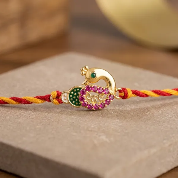 925_Silver_Gold_Plated_Peacock_Design_Rakhi_With_Red_And_Yellow_Thread