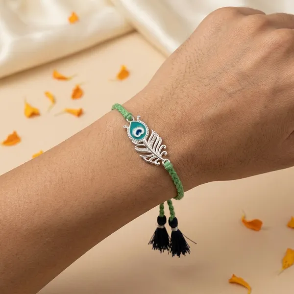 925_Silver_Peacock_Feather_Rakhi_For_Brother_With_Kumkum_Chawal_Bottle_And_Greeting_Card
