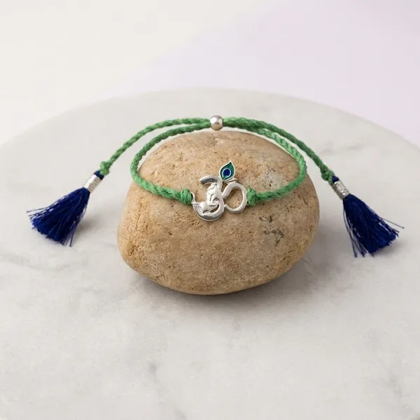 925_Silver_Om_Charm_Green_Thread_With_Roli_Chawal_Glass_Bottle_And_Happy_Rakhi_Card