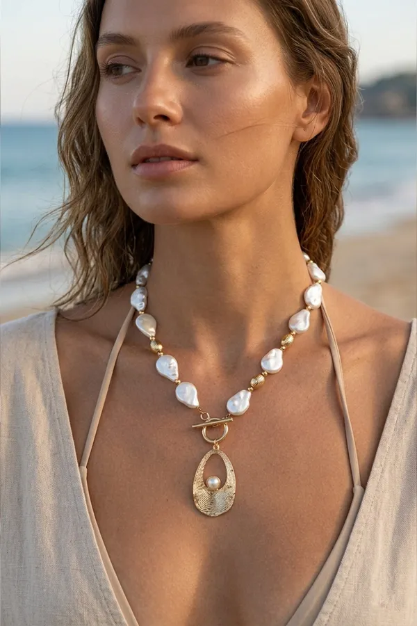 Artisan_Gold-tone_Toggle_Necklace_Featuring_Baroque_Pearls_and_Inset_Detail