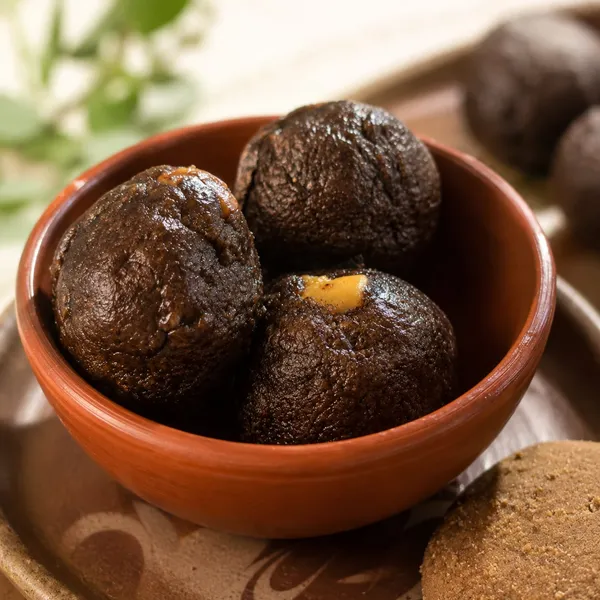 Wholesome_Homemade_Ragi_Dates_Laddus_made_with_pure_butter,_nutrient-dense_Nachani,_and_naturally_sweet_dates._100%_sugar-free_&_preservative-free_healthy_snacks!