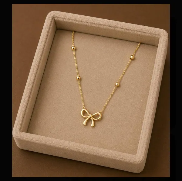Gold_Alloy_Bow_Pendant_Beaded_Chain_Necklace_For_Women