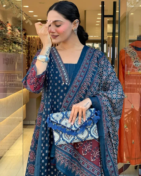 Featuring_Beautiful_Heavy_Suit_Set_Which_Is_Beautifully_Decorated_With_Handwork_Weaving_And_Prints_It_I_Paired_With_Matching_Pants_And_Dupatta_Swsk06