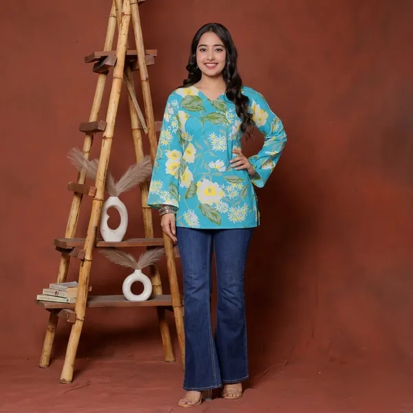 Elevate_Your_Ethnic_Wardrobe_With_This_Chic_And_Vibrant_Fuchsia_Pink_Blue_Skay_Green_Kurti_Featuring_A_Striking_White_Lily_Print_This_Piece_Is_Designed_For_The_Modern_Woman_Who_Loves_A_Mix_Of_Classic_Charm_And_Edgy_Details_Rrrd40_Sky_Blue