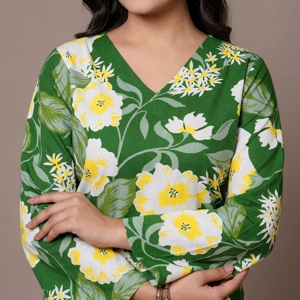Elevate_Your_Ethnic_Wardrobe_With_This_Chic_And_Vibrant_Fuchsia_Pink_Blue_Skay_Green_Kurti_Featuring_A_Striking_White_Lily_Print_This_Piece_Is_Designed_For_The_Modern_Woman_Who_Loves_A_Mix_Of_Classic_Charm_And_Edgy_Details_Rrrd40_Dark_Green