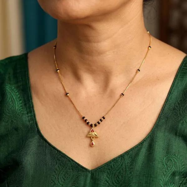 Stylish_Golden_Plated_Mangal_sutra_Necklace_for_Women_-_Black_Beads_with_Triangle_Ruby_Pendant_-_Long_Chain_Daily_Wear_Mangalsutra