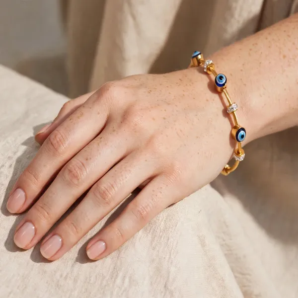 Triple_Evil_Eye_Gold_Cuff_Bracelet_with_Crystal_Spacers