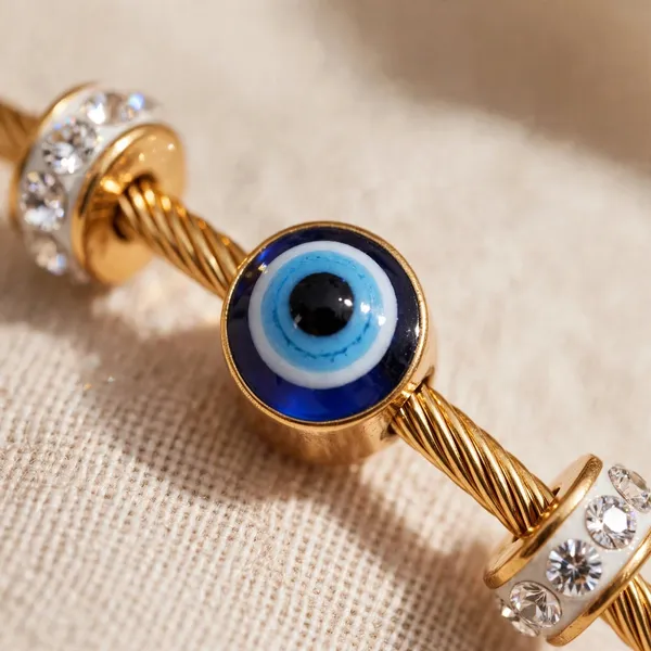 Triple_Evil_Eye_Gold_Cuff_Bracelet_with_Crystal_Spacers