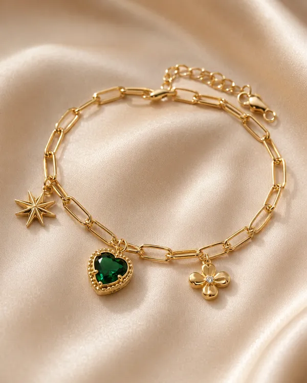 Gold_Charm_Bracelet_with_Green_Heart_Stone_Star_and_Floral_Charms