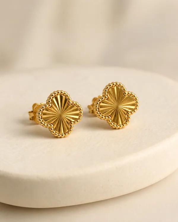 Gold_Clover_Stud_Earrings_with_Textured_Sunburst_Pattern