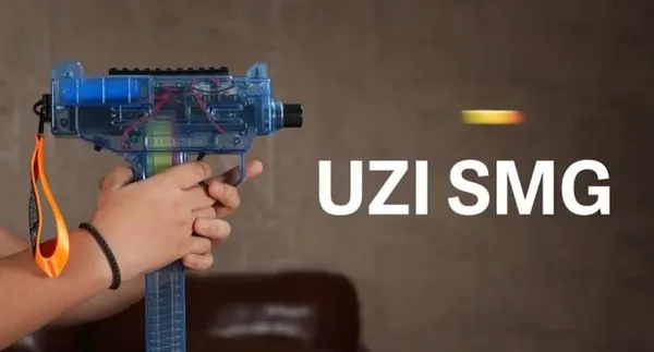 Wumble_Toy_Uzi-SMG_Electric_Automatic_Soft_Bullet_Toy_Gun_Blaster_with_Transparent_Clear_Shell,_LED_Light_Effects_&_Shoulder_Strap_|_Rapid_Auto-Burst_Shooting_with_20_Soft_Foam_Darts_for_Kids_(Ages_3+_Years)