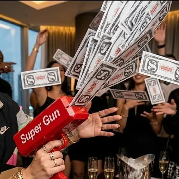 Wumble_Toy_Super_Gun_The_Cash_Cannon_Money_Gun_Toy_For_Kids_And_Adults_With_1_Bundle_Of_Fake_Dollar_For_Flawless_Enjoyment_-_Suitable_For_Parties,_Weddings,_Birthdays_-_Press_The_Trigger_And_See_The_Magic