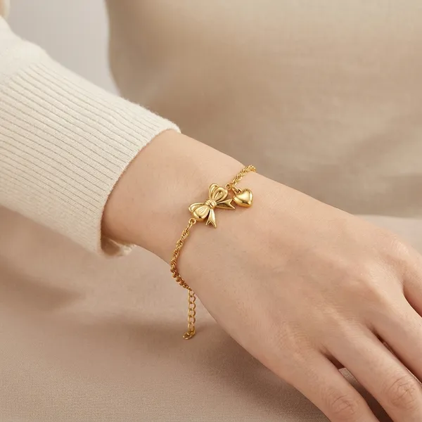 Gold_Bow_And_Heart_Charm_Chain_Bracelet_For_Women