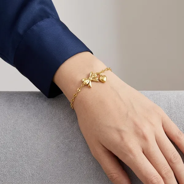 Gold_Bow_And_Heart_Charm_Chain_Bracelet_For_Women