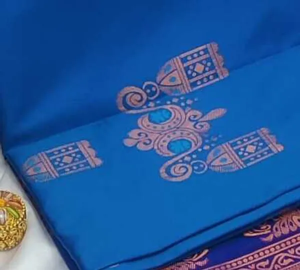 Banarasi_Kanjeevaram_Silk_Saree_with_Rich_Zari_Weaving_and_festive_and_wedding_wear_And_Party_Wear_collection_With_Tassels_Latkan_And_Blouse_Piece