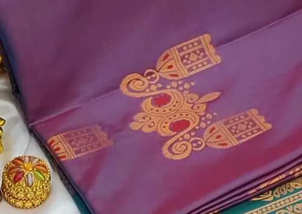 Banarasi_Kanjeevaram_Silk_Saree_with_Rich_Zari_Weaving_and_festive_and_wedding_wear_And_Party_Wear_collection_With_Tassels_Latkan_And_Blouse_Piece
