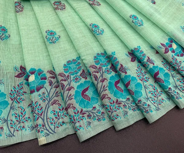 Cotton_Silk_Linen_Saree_beautifully_cotton_saree_featuring_delicate_floral_prints_and_designed_border_daily_wear,_office_Party_Wear_With_tassels_latkan_And_blouse_piece