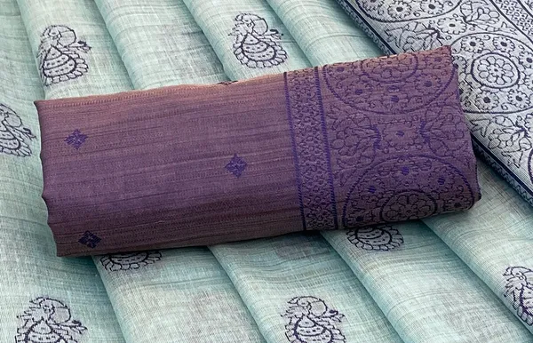 Cotton_Silk_Linen_Saree_beautifully_cotton_saree_featuring_delicate_floral_prints_and_designed_border_daily_wear,_office_Party_Wear_With_tassels_latkan_And_blouse_piece