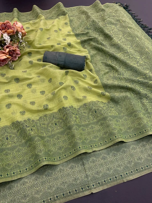 Cotton_Silk_Linen_Saree_beautifully_cotton_saree_featuring_delicate_floral_prints_and_designed_border_daily_wear,_office_Party_Wear_With_tassels_latkan_And_blouse_piece