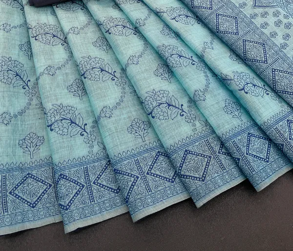 Cotton_Silk_Linen_Saree_beautifully_cotton_saree_featuring_delicate_floral_prints_and_designed_border_daily_wear,_office_Party_Wear_With_tassels_latkan_And_blouse_piece