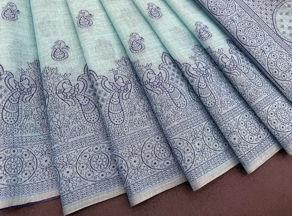 Cotton_Silk_Linen_Saree_beautifully_cotton_saree_featuring_delicate_floral_prints_and_designed_border_daily_wear,_office_Party_Wear_With_tassels_latkan_And_blouse_piece