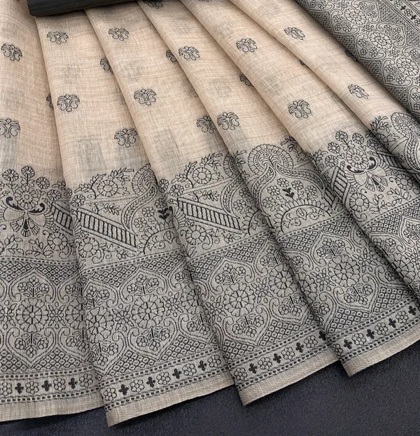 Cotton_Silk_Linen_Saree_beautifully_cotton_saree_featuring_delicate_floral_prints_and_designed_border_daily_wear,_office_Party_Wear_With_tassels_latkan_And_blouse_piece