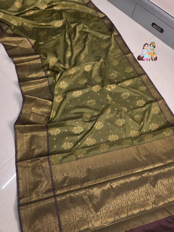 Mehamdi_Banarasi_Silk_Saree_with_kanjivaram_Silver_Zari_Motifs_and_Border_Party_wear_with_tassels_and_latkans_With_blouse_piece