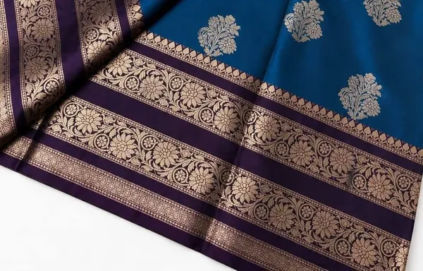 Royal_Blue_Banarasi_Silk_Saree_with_kanjivaram_Silver_Zari_Motifs_and_Purple_Border_Party_wear_with_tassels_and_latkans_With_blouse_piece