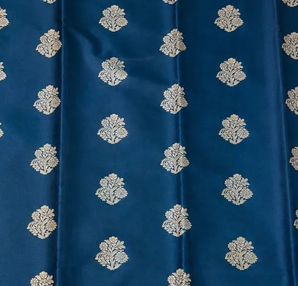 Royal_Blue_Banarasi_Silk_Saree_with_kanjivaram_Silver_Zari_Motifs_and_Purple_Border_Party_wear_with_tassels_and_latkans_With_blouse_piece