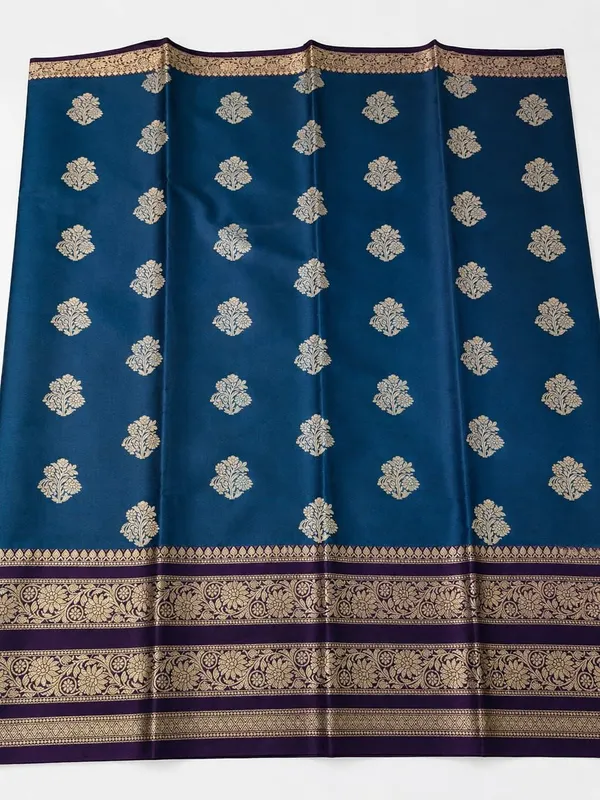 Royal_Blue_Banarasi_Silk_Saree_with_kanjivaram_Silver_Zari_Motifs_and_Purple_Border_Party_wear_with_tassels_and_latkans_With_blouse_piece