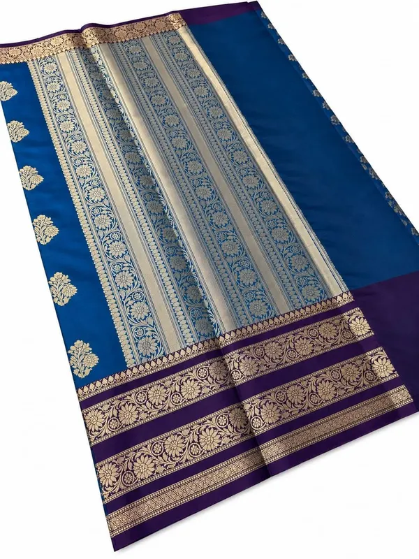 Royal_Blue_Banarasi_Silk_Saree_with_kanjivaram_Silver_Zari_Motifs_and_Purple_Border_Party_wear_with_tassels_and_latkans_With_blouse_piece