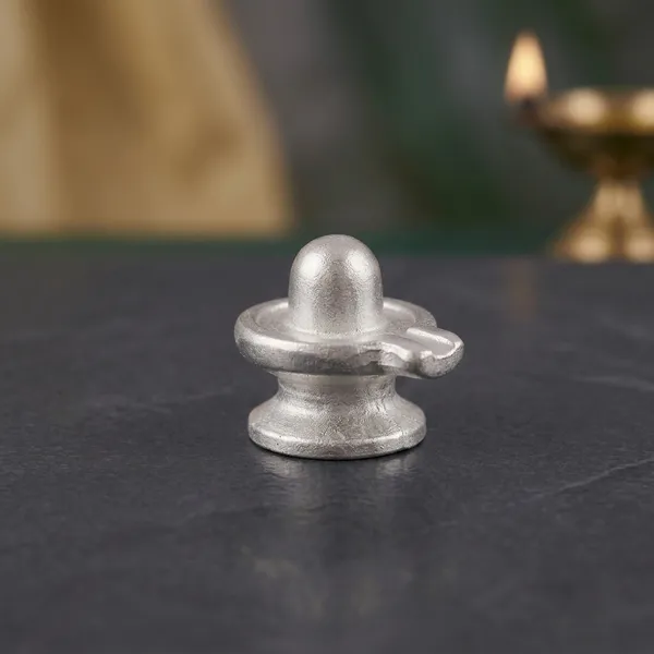 Authentic_Parad_Shivling_60_Grams,_2.5_cm_Height_100%_Pure_Mercury_Shiva_Lingam_for_Vastu_And_Abhishekam