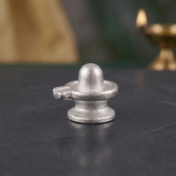 Authentic_Parad_Shivling_60_Grams,_2.5_cm_Height_100%_Pure_Mercury_Shiva_Lingam_for_Vastu_And_Abhishekam
