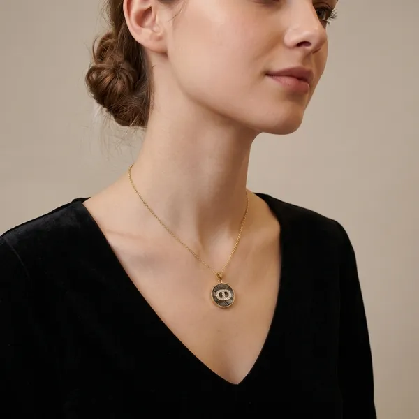 Gold_Toned_Chain_Pendant_Necklace_With_Crystal_Detail