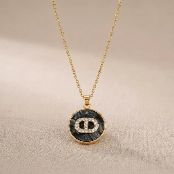 Gold_Toned_Chain_Pendant_Necklace_With_Crystal_Detail