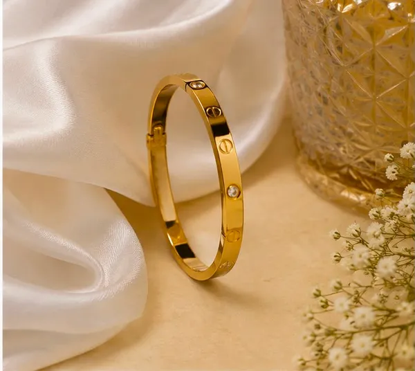Gold_Stainless_Steel_Ad_Studded_Bangle_For_Women