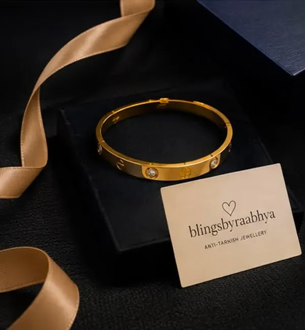 Gold_Stainless_Steel_Ad_Studded_Bangle_For_Women
