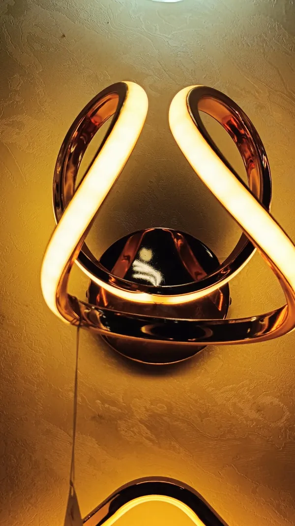 Aluminum_Modern_Curved_Ribbon_Rose_Gold_LED_Wall_Light