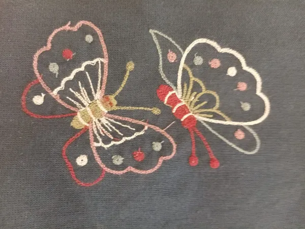 Navy_Blue_Cotton_Straight_Butterfly_Embroidered_Kurti_For_Women