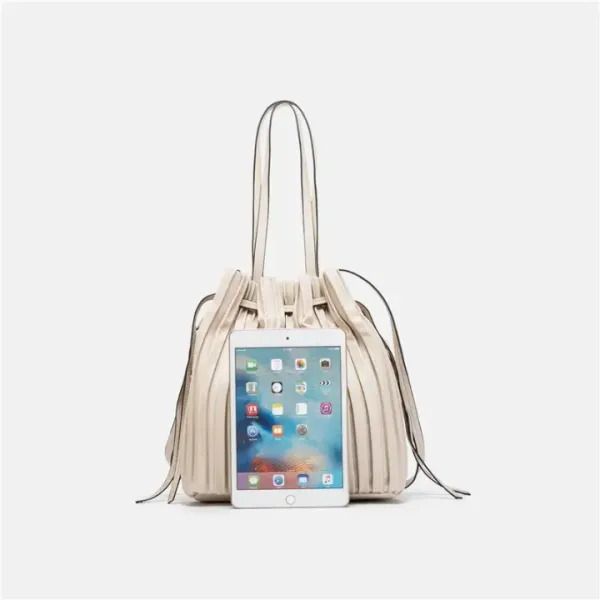 Veloure_Aria_Pleated_Bucket_Bag_|_Apricot_Vegan_Leather_Drawstring_Purse