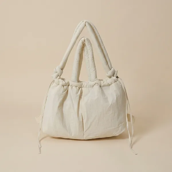 Veloure_Aura_Puffer_Tote_In_Beige_Lightweight_Luxury_Drawstring_Handbag