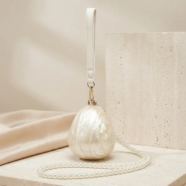 Veloure_Lumina_Pearl_Droplet_Clutch_Bag_-_Luxury_Sculptural_Evening_Purs