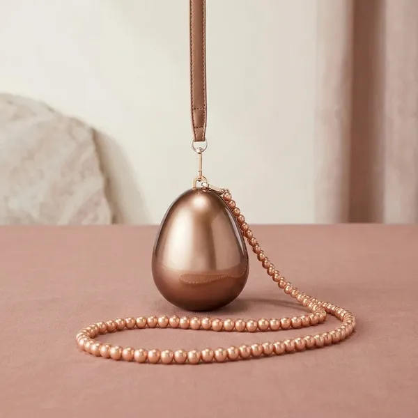 Veloure_Sienna_Metallic_Egg_Clutch_Bag_-_Luxury_Bronze_Evening_Purse