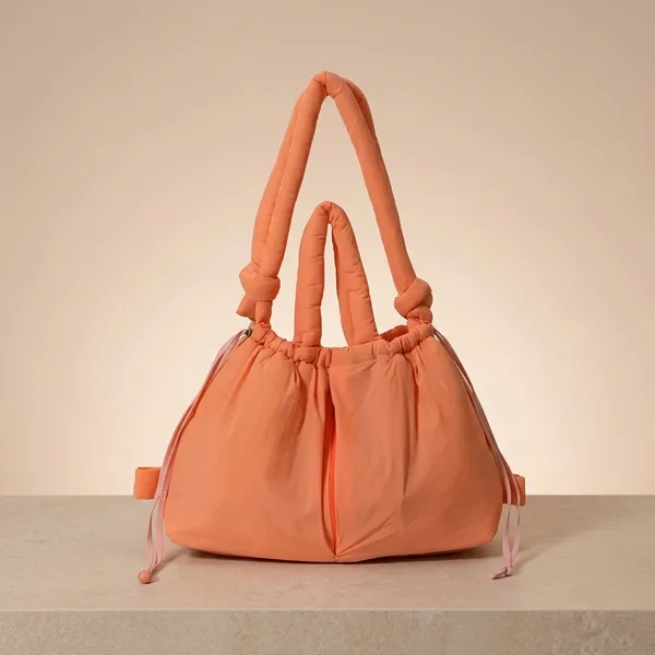 The_Dalauda_Aura_Puffer_In_Orange