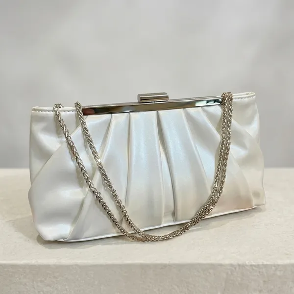 Veloure_Shop_The_Exquisite_Pliss_Ruched_Frame_Clutch._Featuring_An_Arti