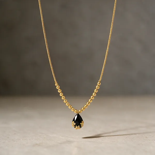 Black_And_Gold_Plated_Stone_Pendant_Mangalsutra_For_Women