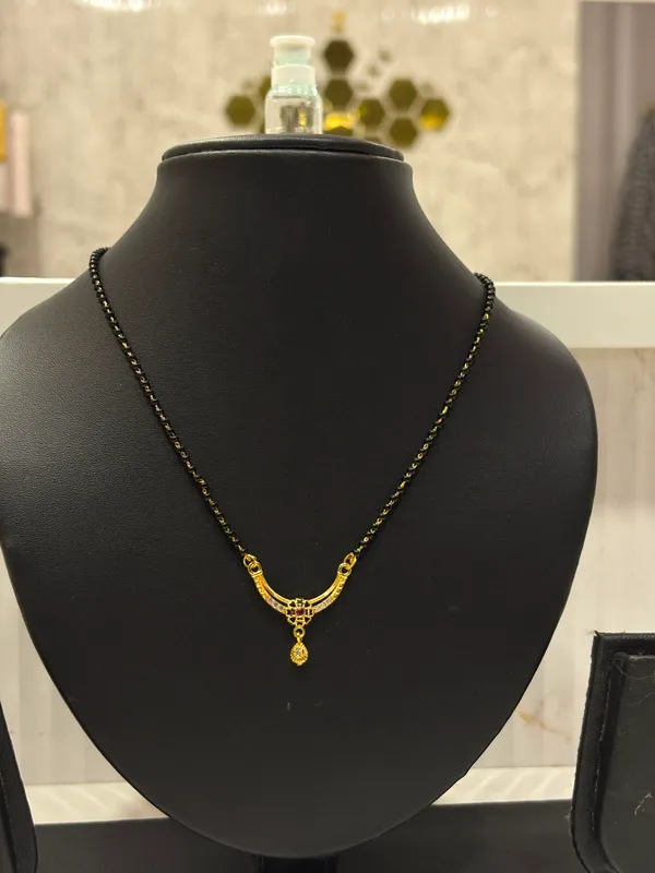 Black_And_Gold_Plated_Brass_Beed_Warm_Mangalsutra_For_Women